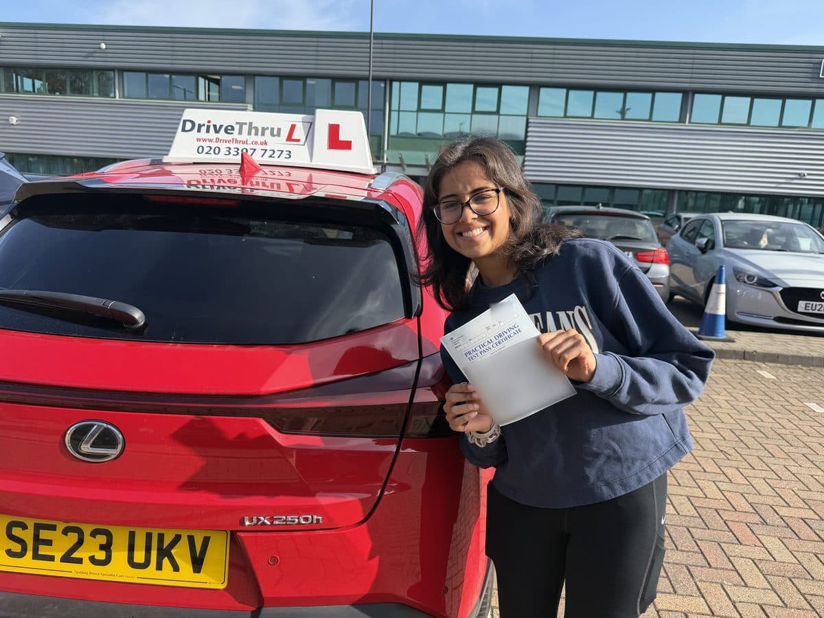 A DriveThruL pupil from Canary Wharf (E14) with her pass certificate, after passing at Sidcup test centre