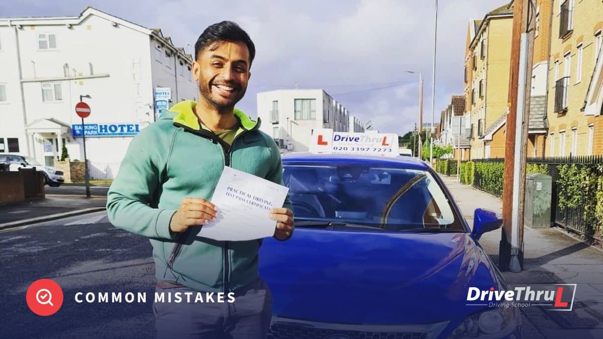 DriveThruL pupil with his pass certificate beside the car