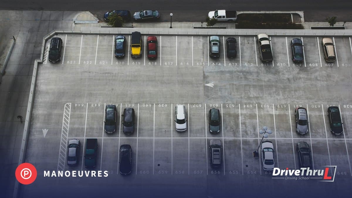 DriveThruL Driving Hub card: Bay parking, forward and reverse. Car park with marked bays seen from above