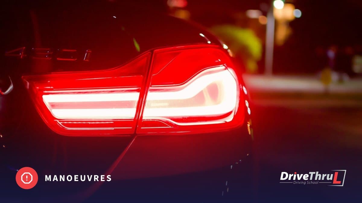 Red brake lights of a car at night