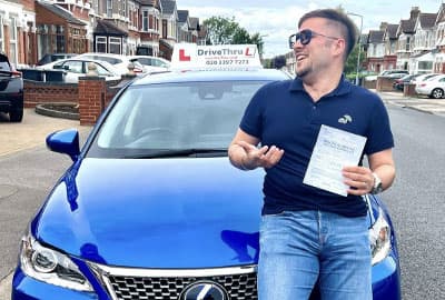 DriveThruL learner with car after passing