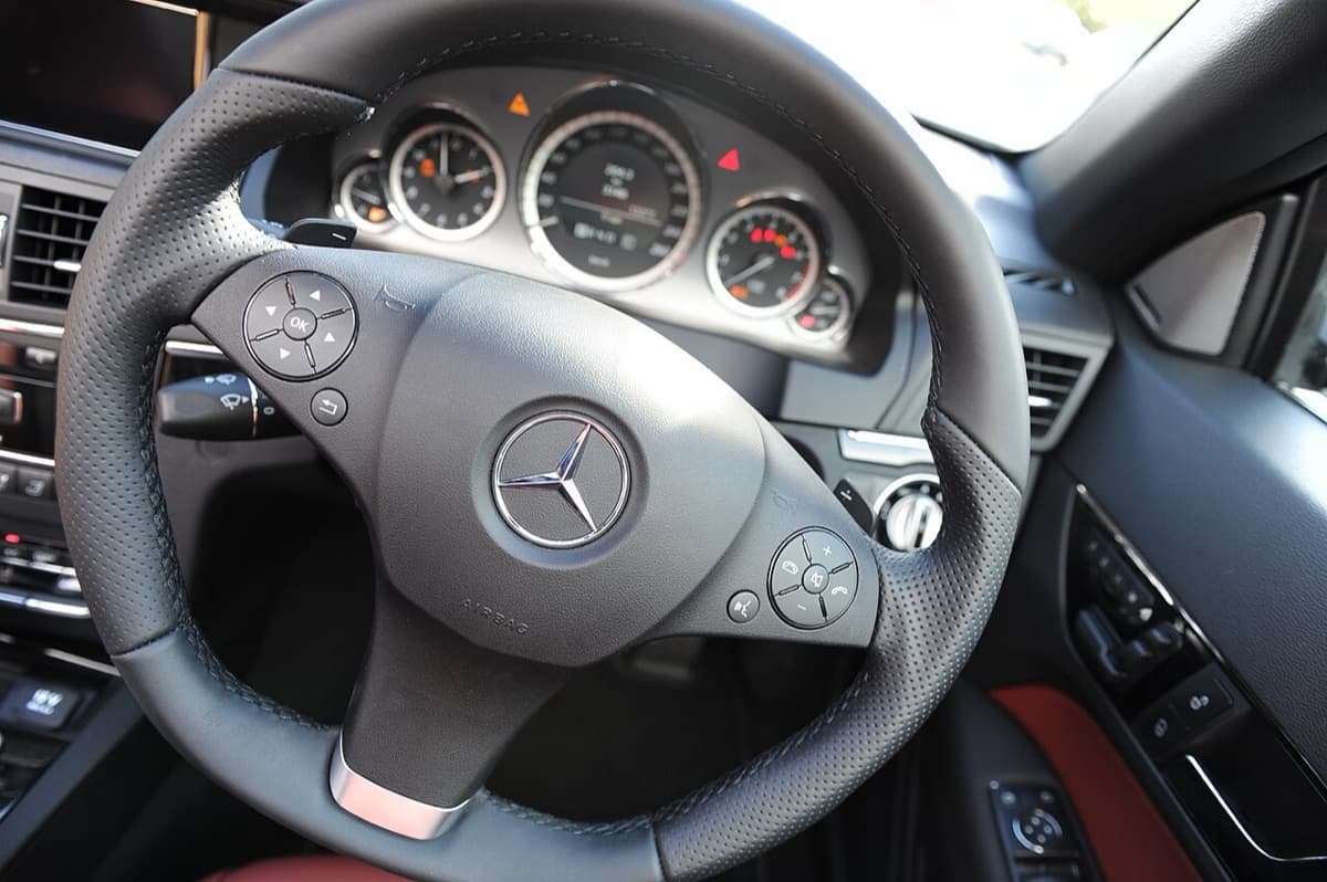 The horn pad in the centre of a steering wheel