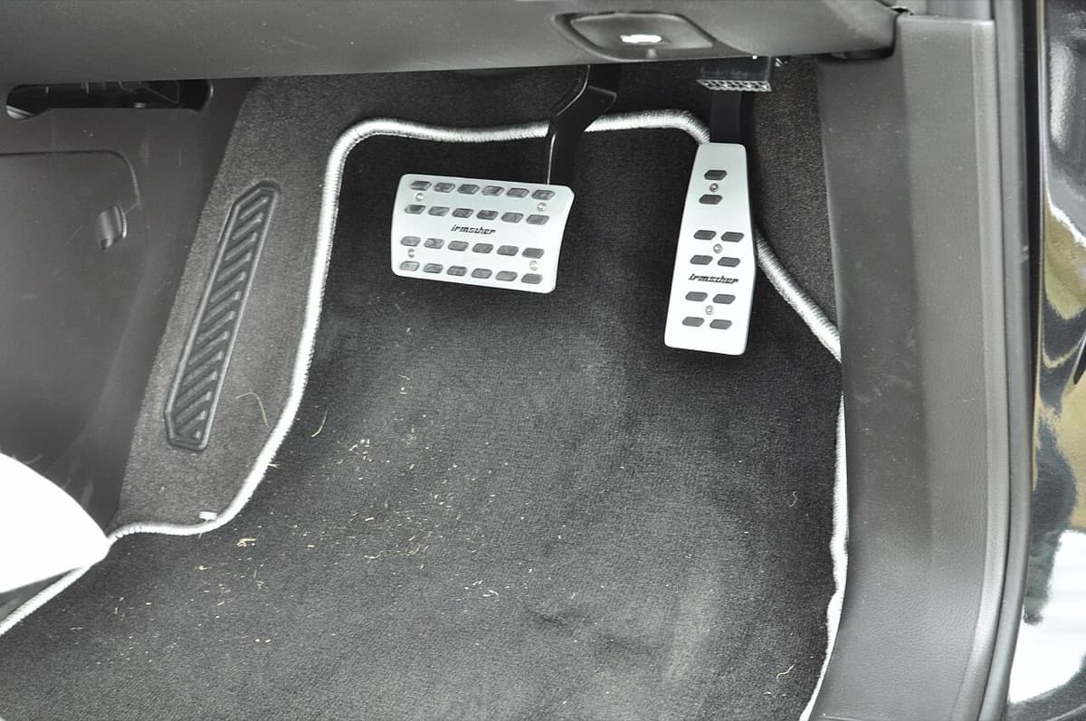The pedals in a car footwell