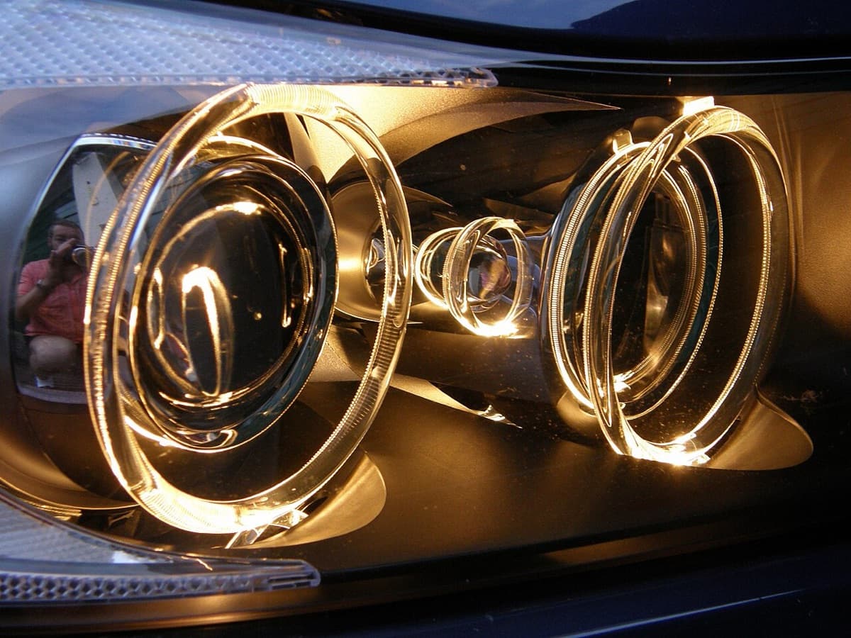 A car headlight switched on