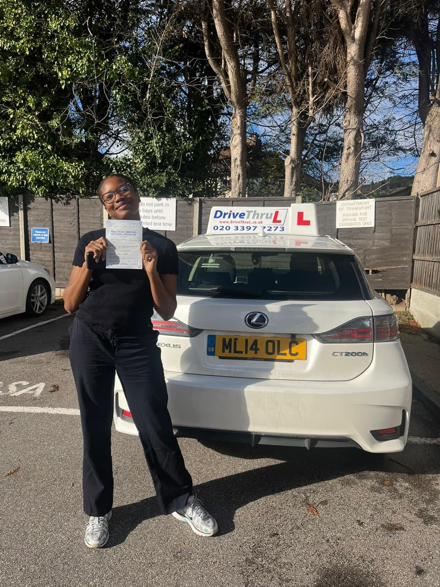 DriveThruL student happy after passing driving test
