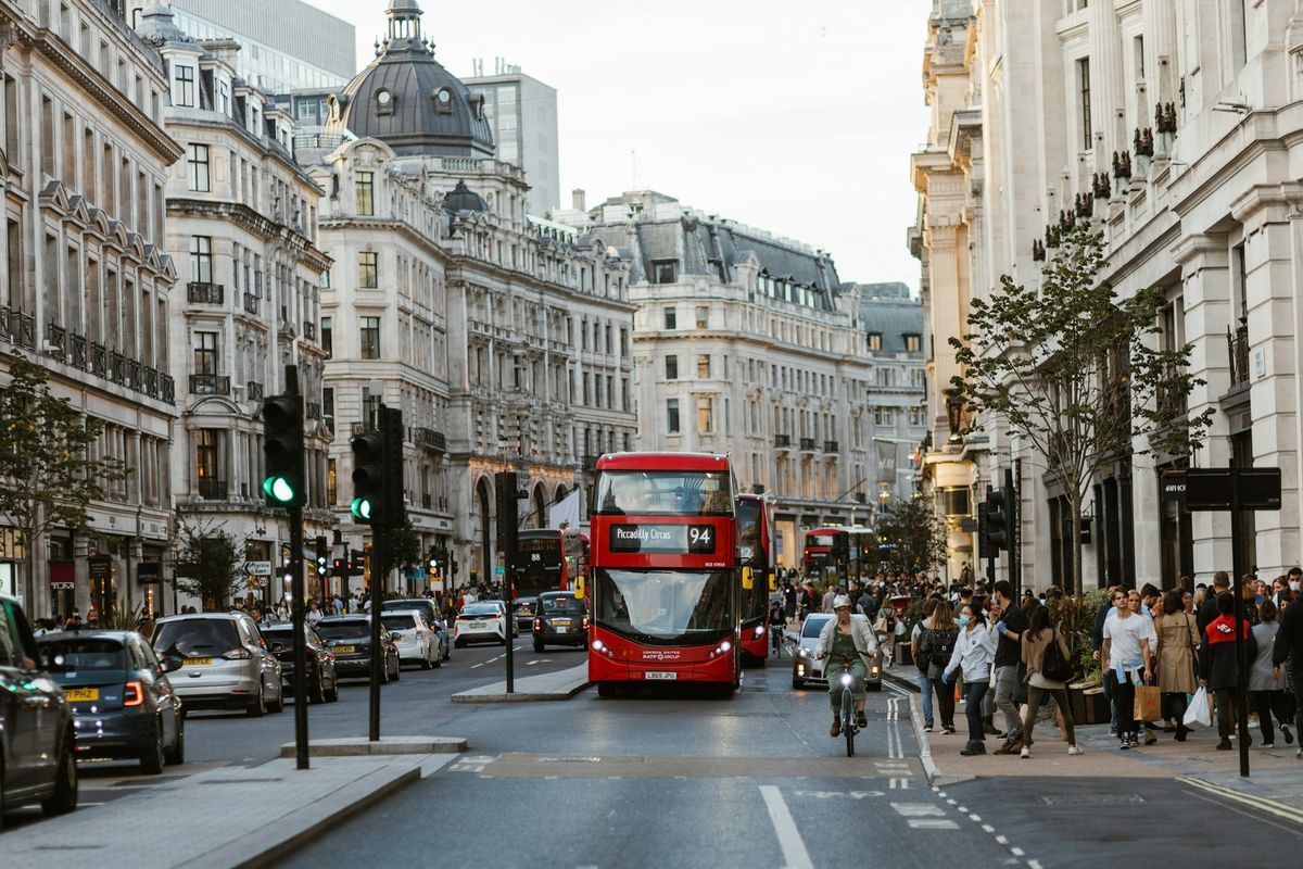 Buses, taxis and cyclists on a busy London street