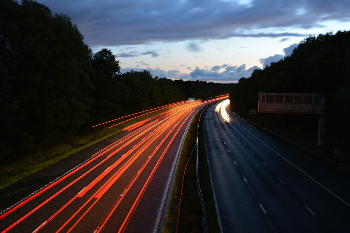 Traffic on a motorway at dusk