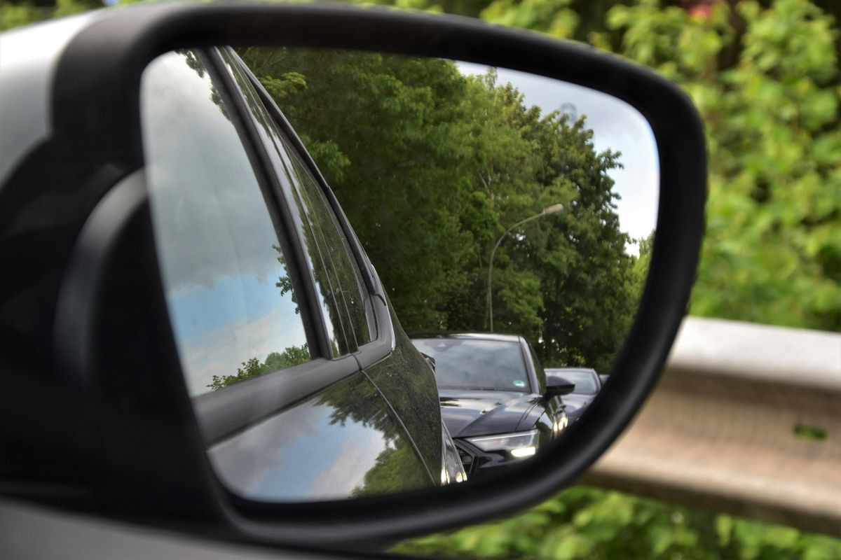 View in a car’s door mirror